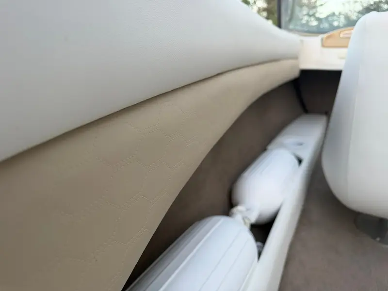 Close-up of tan side panel with honeycomb stitching